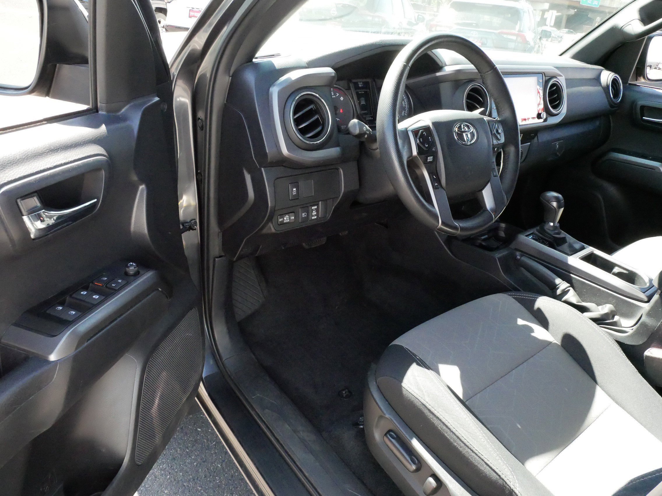 Certified 2023 Toyota Tacoma TRD Sport with VIN 3TMCZ5AN7PM631328 for sale in Brooklyn Center, Minnesota