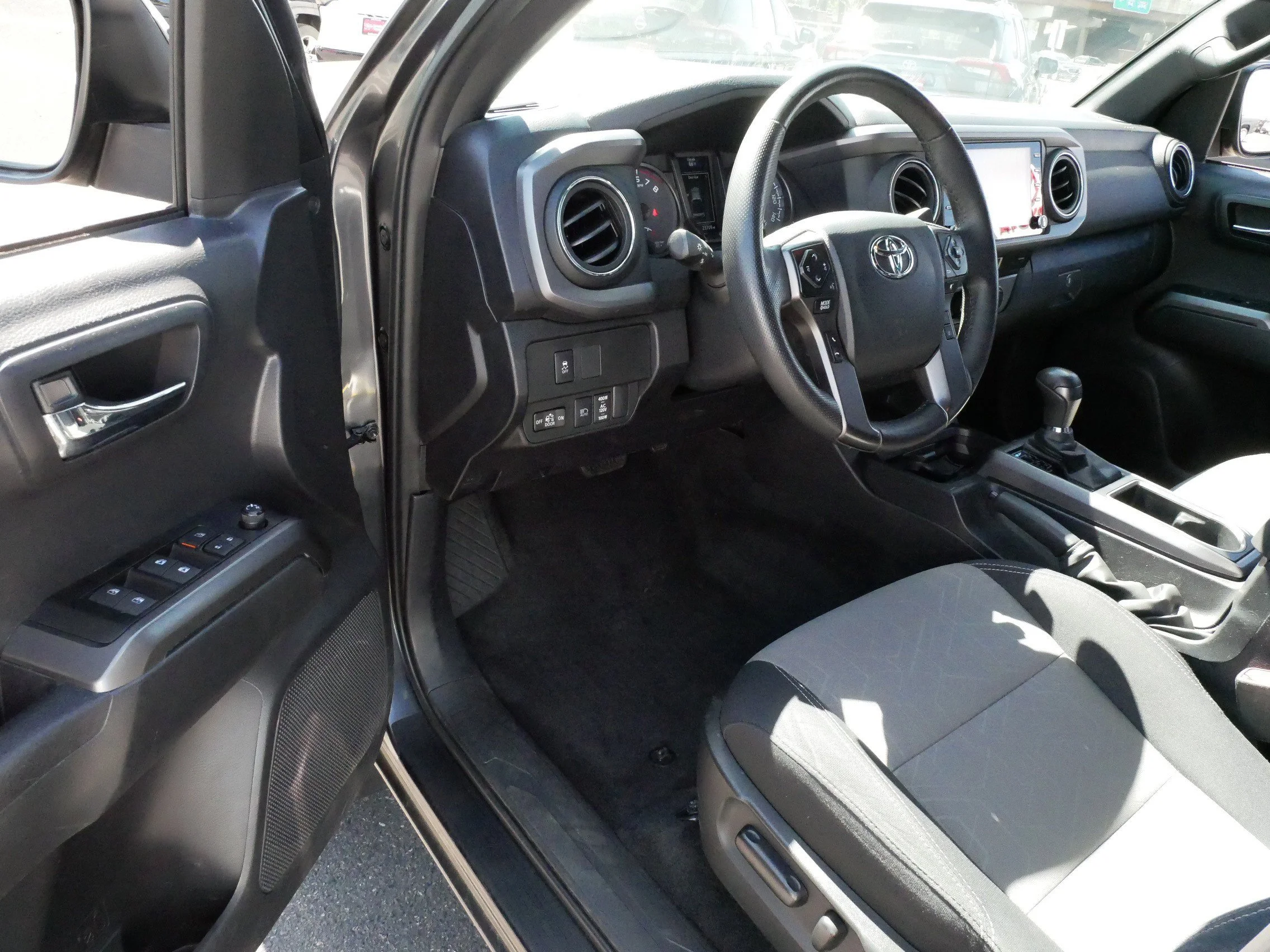 Certified 2023 Toyota Tacoma TRD Sport with VIN 3TMCZ5AN7PM631328 for sale in Brooklyn Center, Minnesota