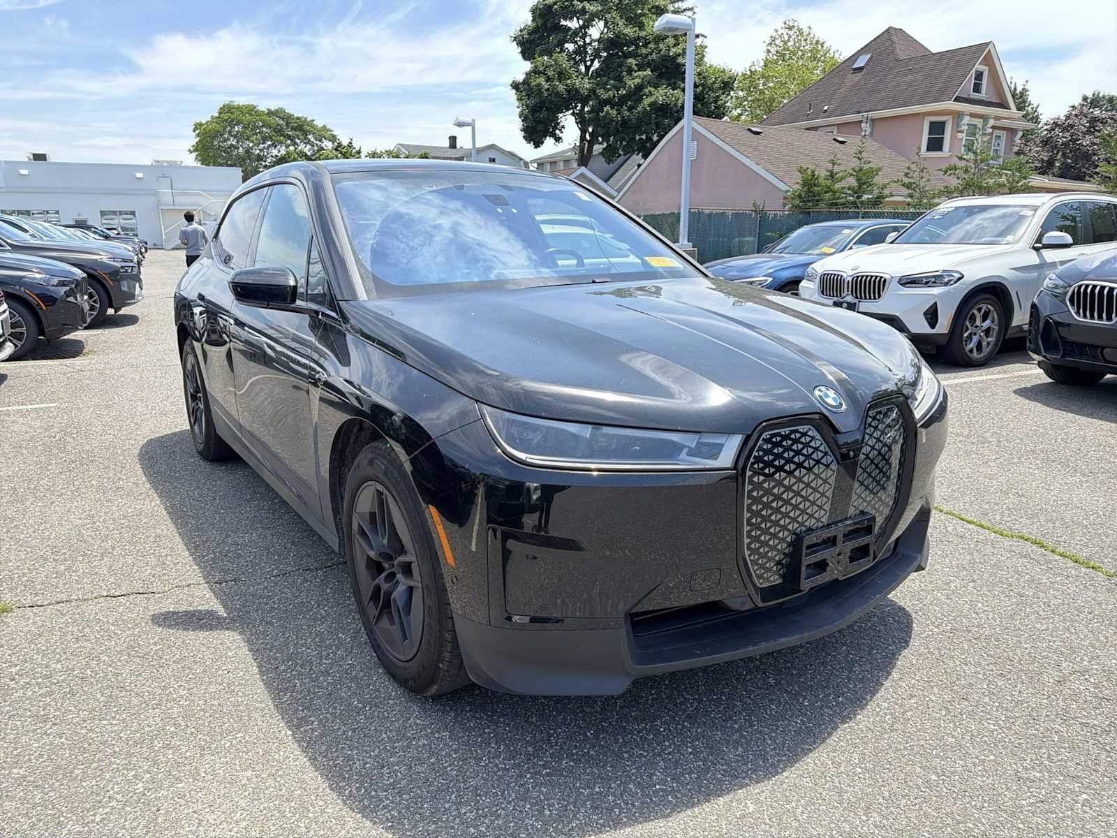 Used 2024 Black Sapphire Metallic BMW xDrive50 image 2