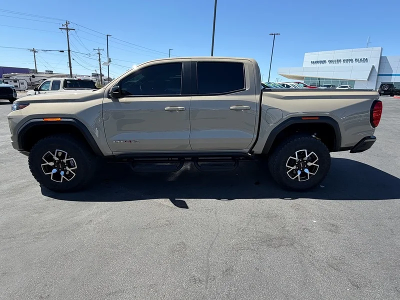Used 2024 Desert Sand Metallic GMC AT4X image 6