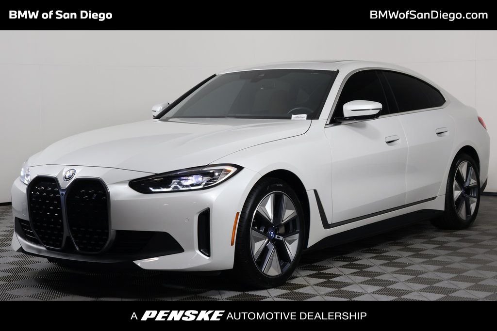 Certified Used 2023 White Metallic BMW eDrive40 image 1