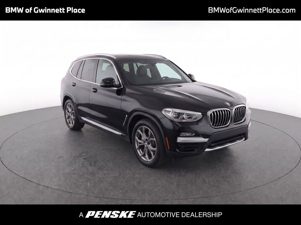 Used 2020 Dark Graphite BMW sDrive30i image 1