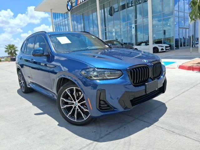 Used 2024 Blue BMW sDrive30i image 1