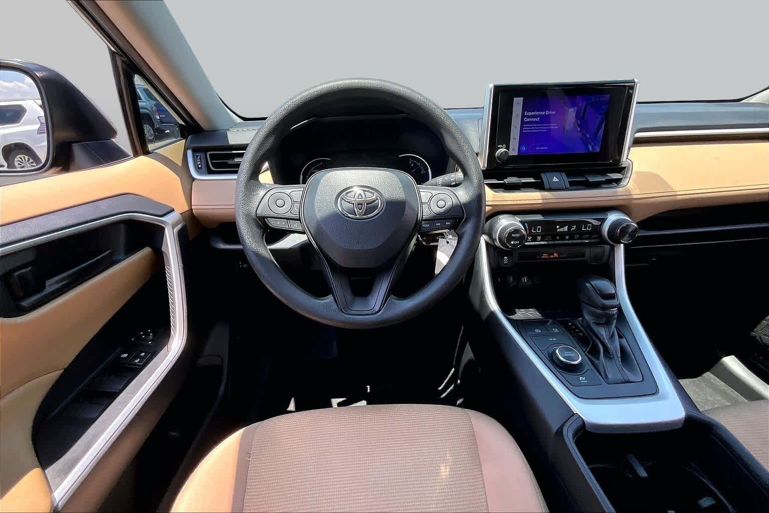 Used 2024 Midnight Black Metallic Toyota Hybrid LE image 6