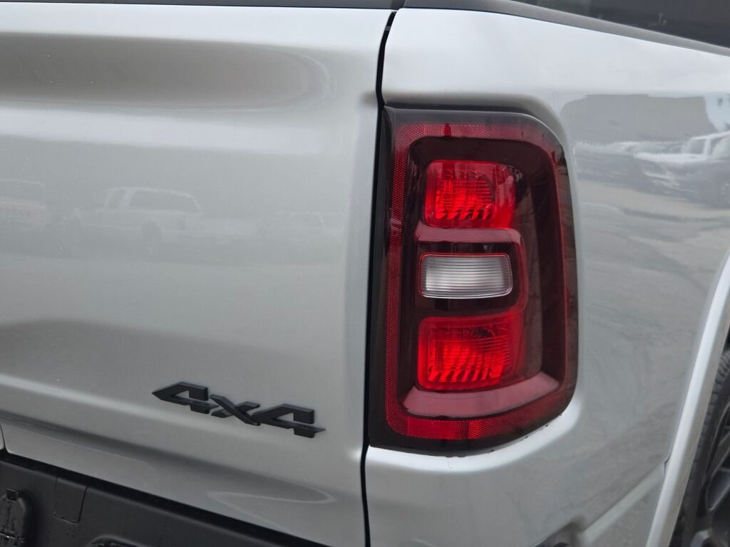 New 2026 Silver Zynith Exterior Paint RAM Laramie image 13