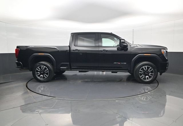 Used 2022 EBONY TWILIGHT METALLIC GMC AT4 image 4