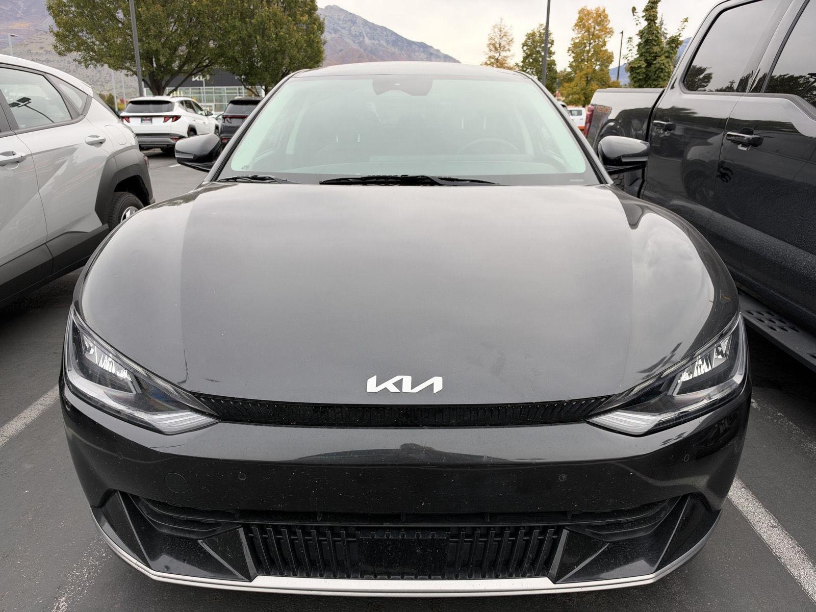 Used 2024 Interstellar Gray kia Wind image 2
