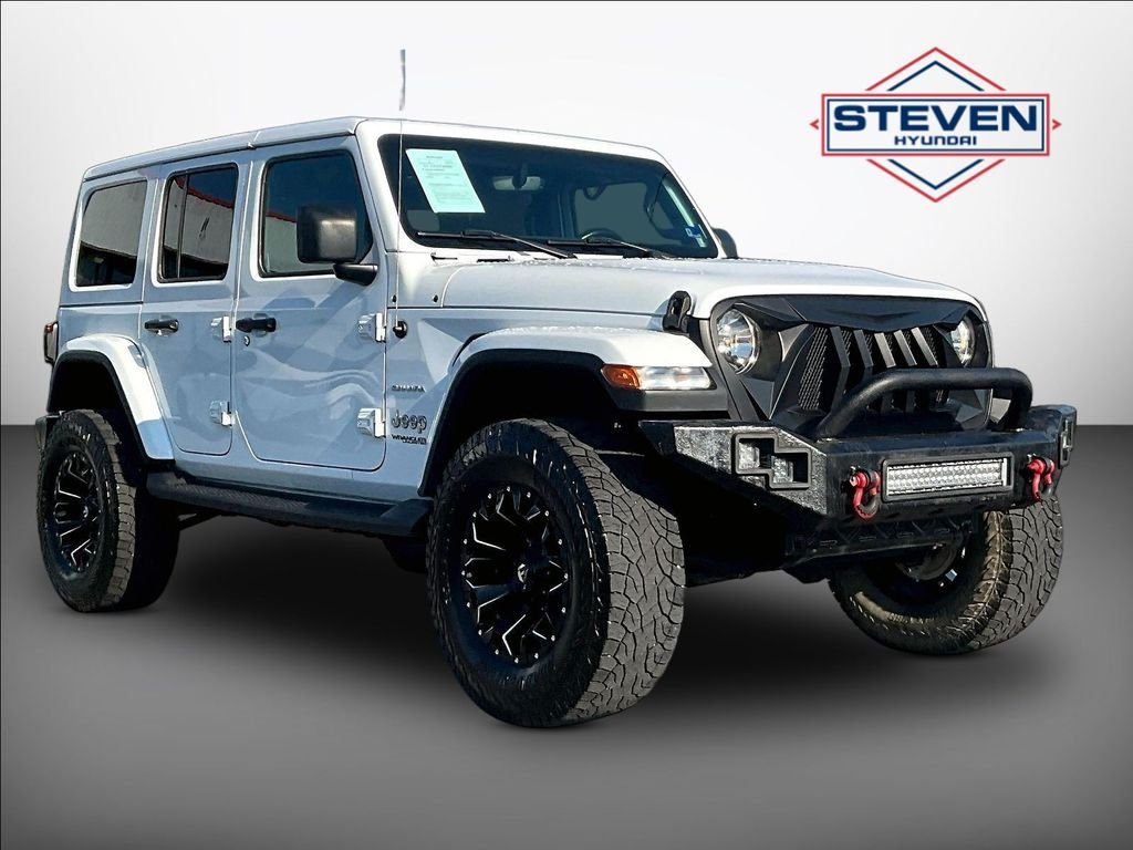 Used 2022 White Jeep Unlimited Sahara image 1