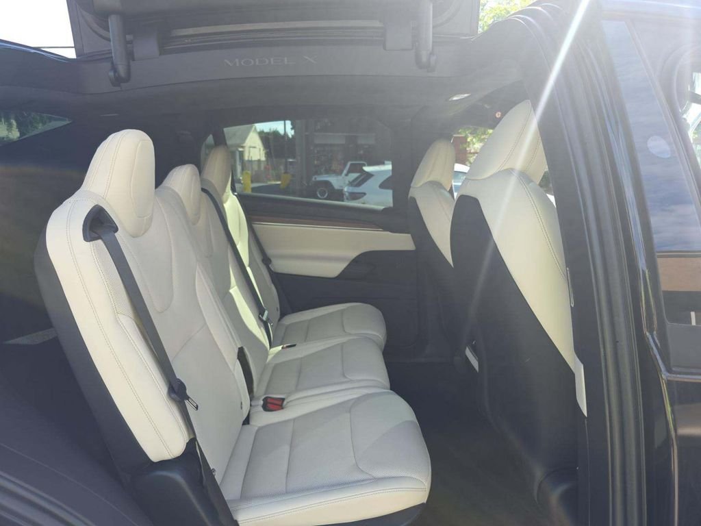 Used 2024 Solid Black Tesla Base image 7