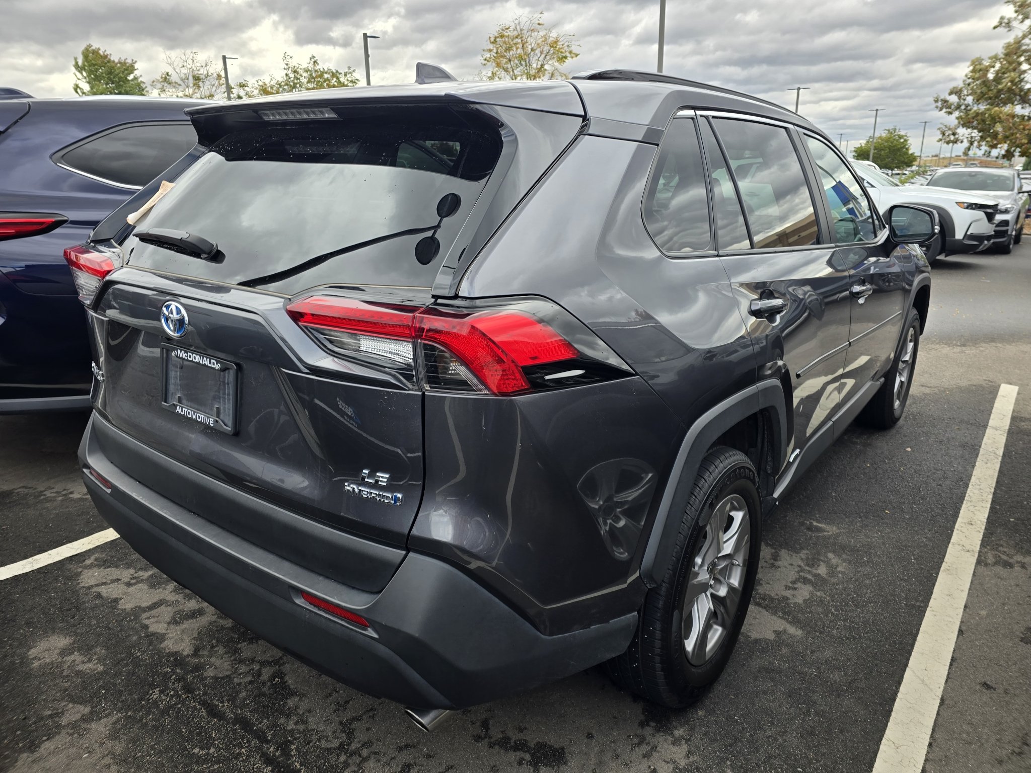Used 2024 Magnetic Gray Metallic Toyota Hybrid LE image 4