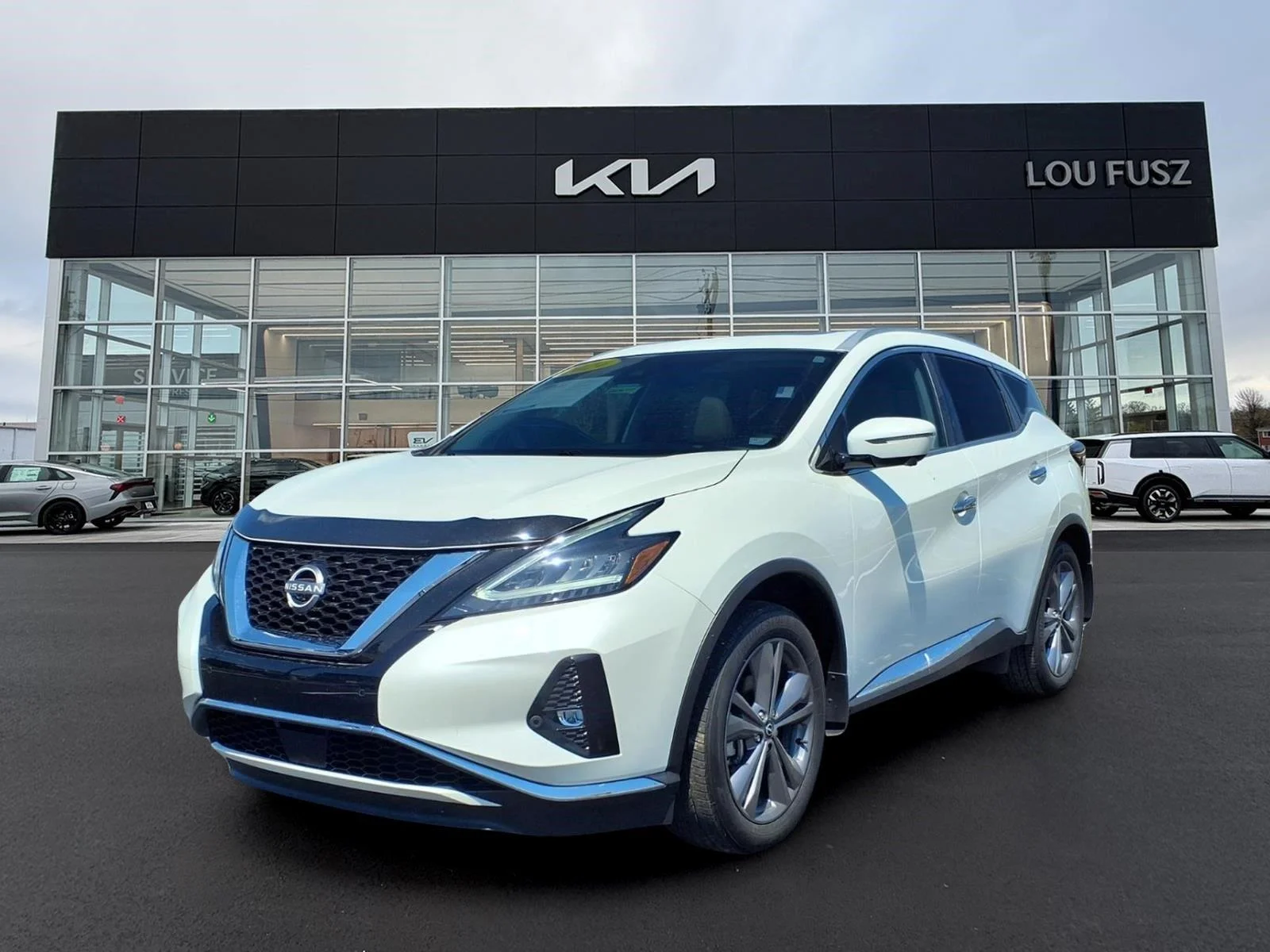 Used 2024 Pearl White Tricoat Nissan Platinum image 1