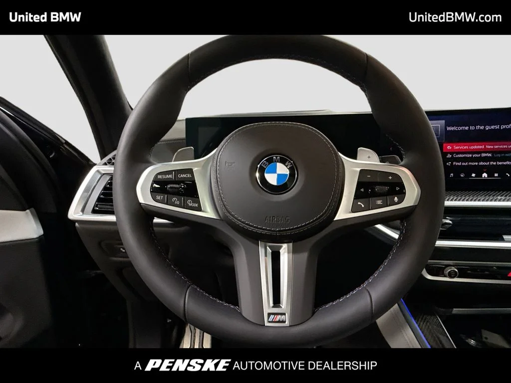 New 2026 Carbon Black Metallic BMW M60i image 6