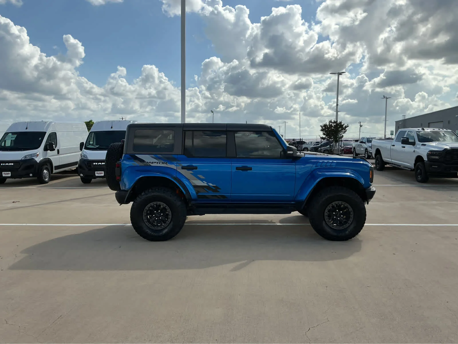 Used 2024 Velocity Blue Metallic Ford Raptor image 5