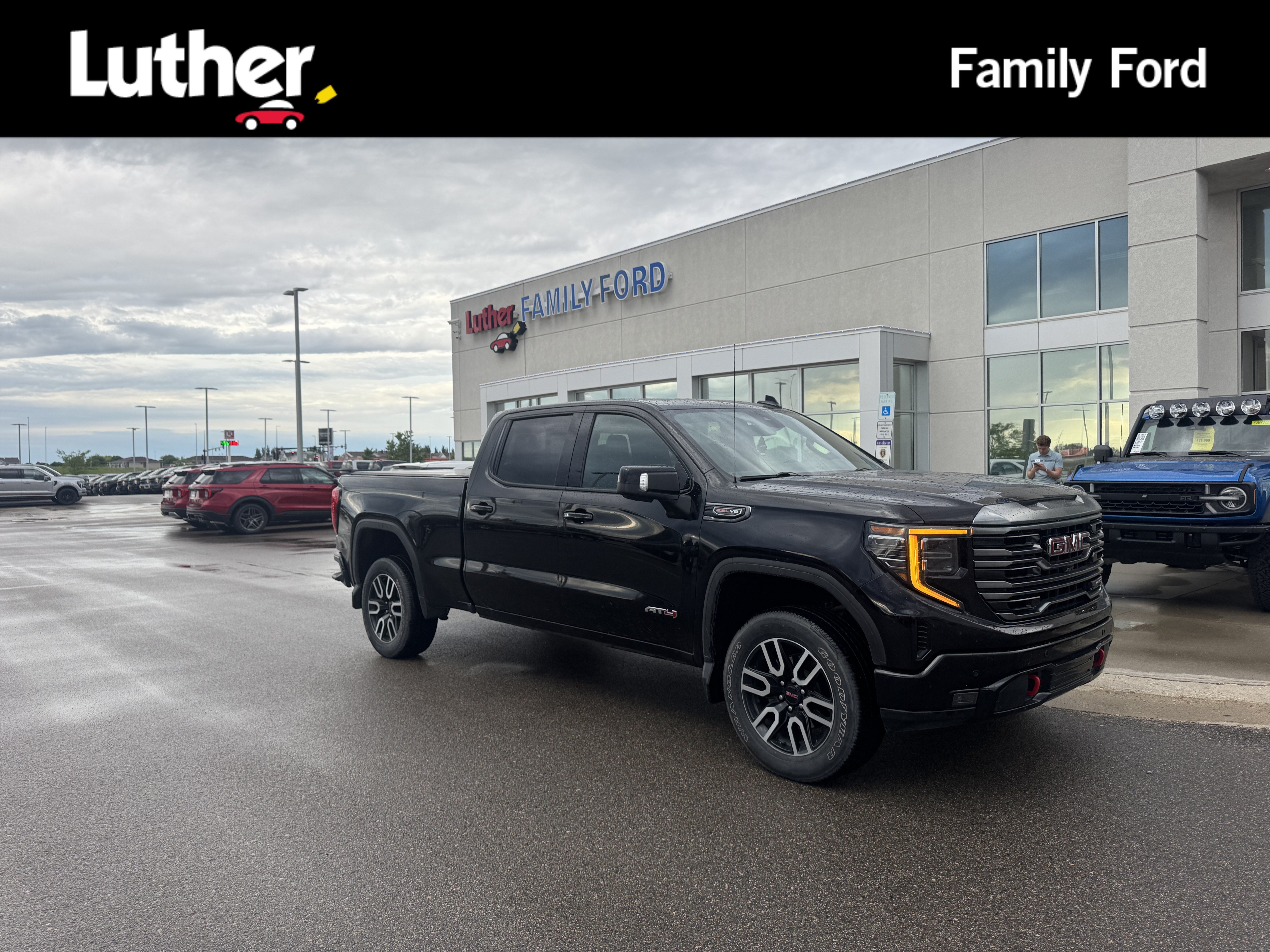 Used 2023 Onyx Black GMC AT4 image 1