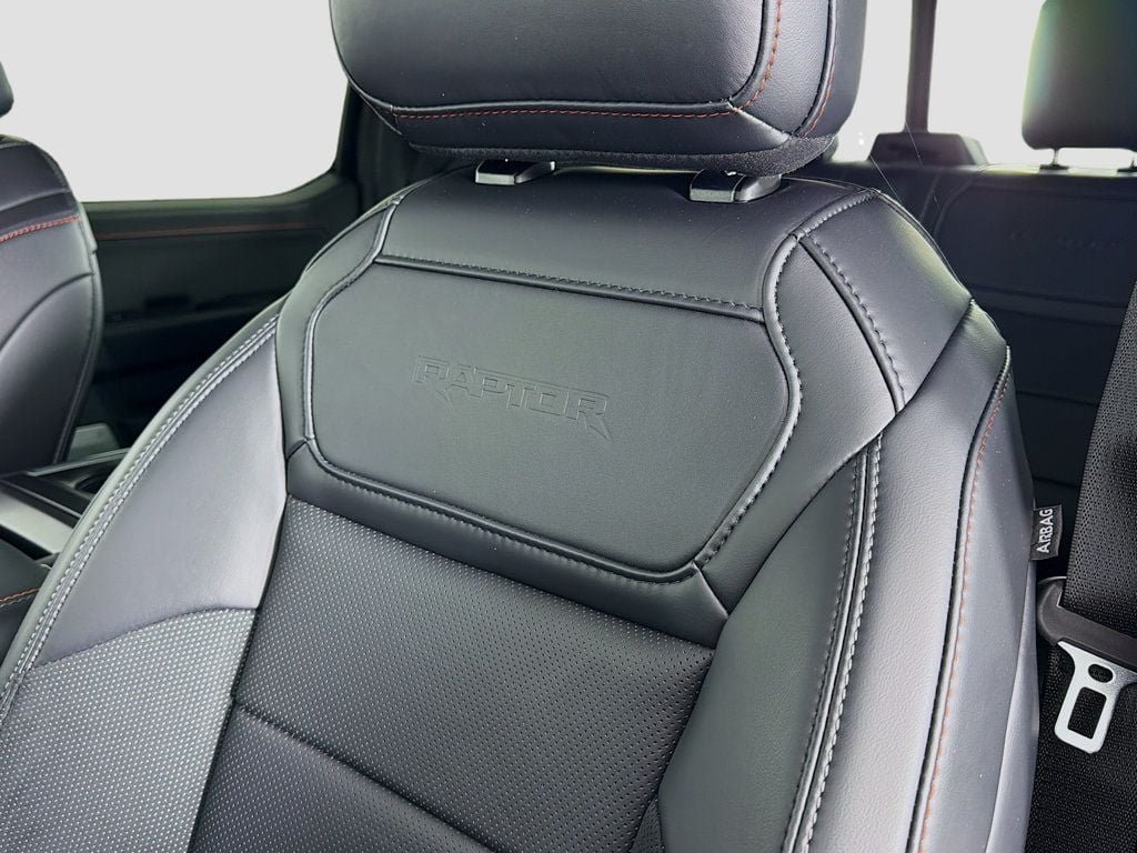 Used 2024 Antimatter Blue Metallic Ford Raptor 4WD SuperCrew 5.5