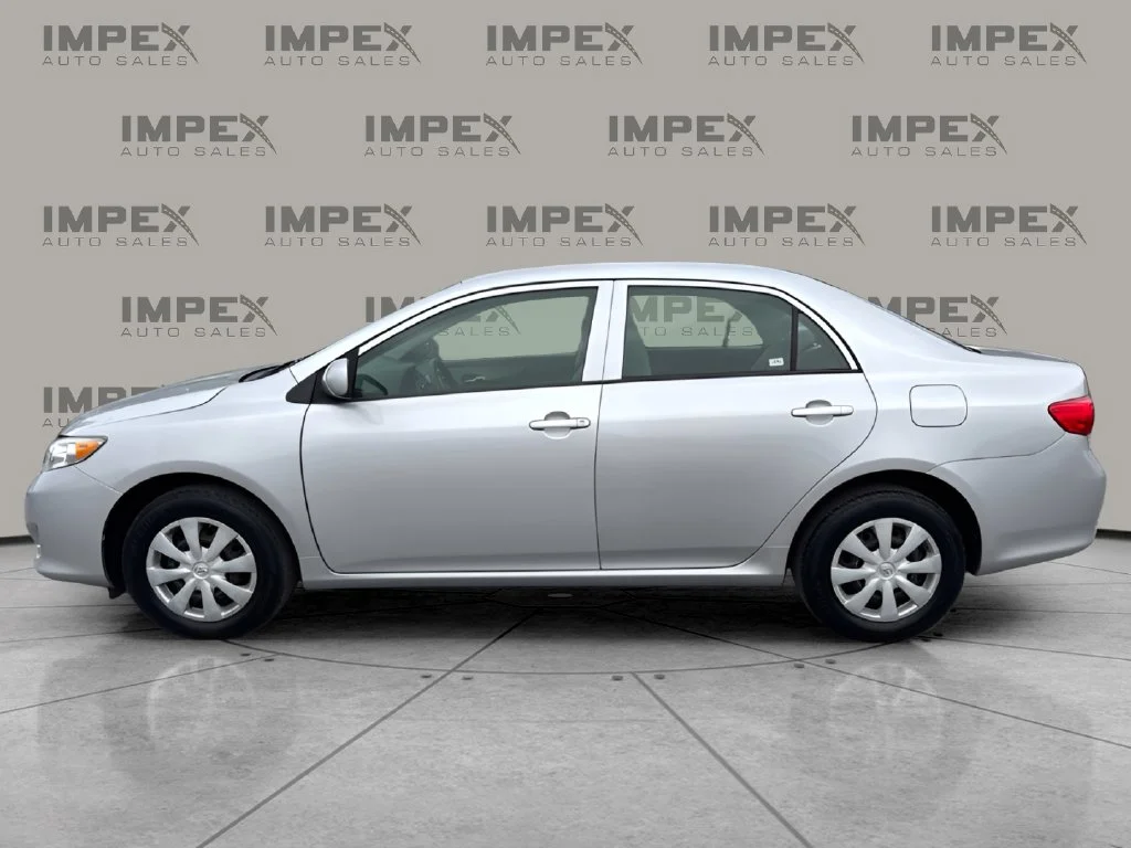 Used 2010 Silver Toyota LE image 2