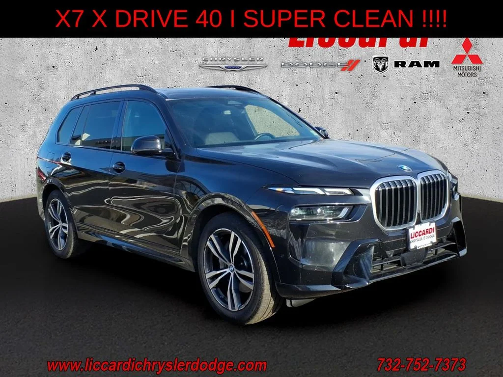 Used 2023 Black BMW xDrive40i image 1