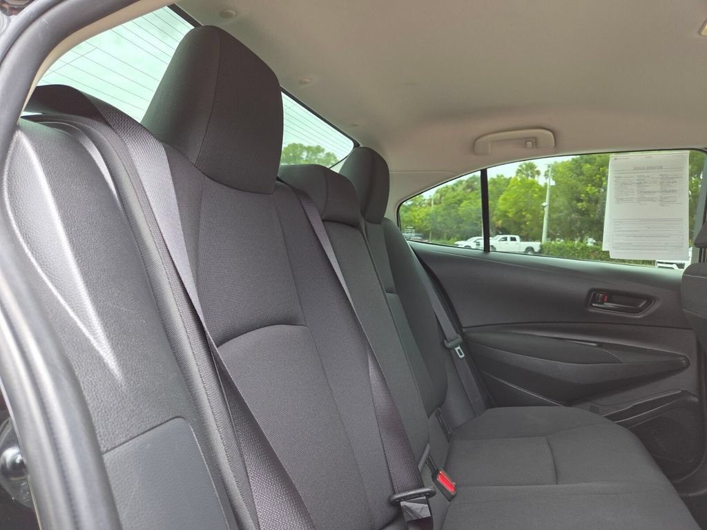 Used 2023 Midnight Black Metallic Toyota Hybrid LE image 19