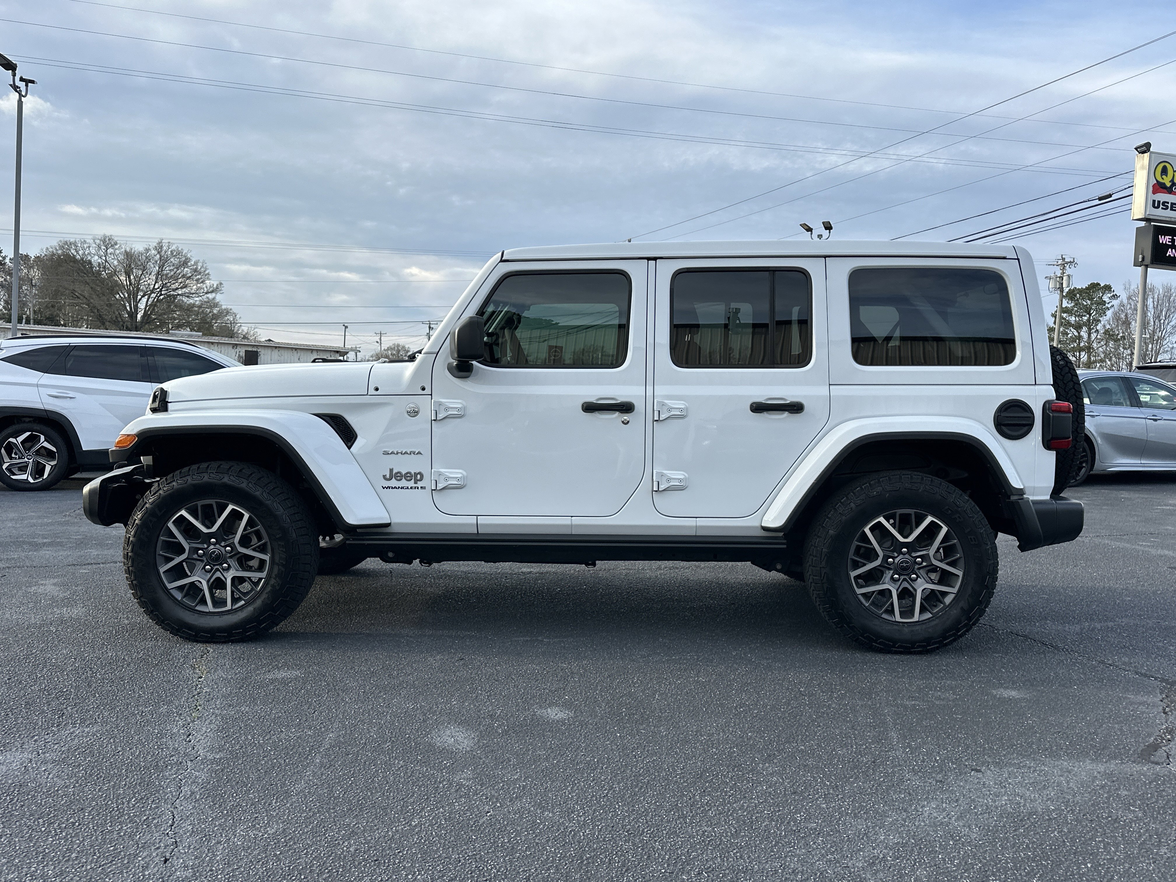 Used 2024 Bright White Clearcoat Jeep Sahara image 5