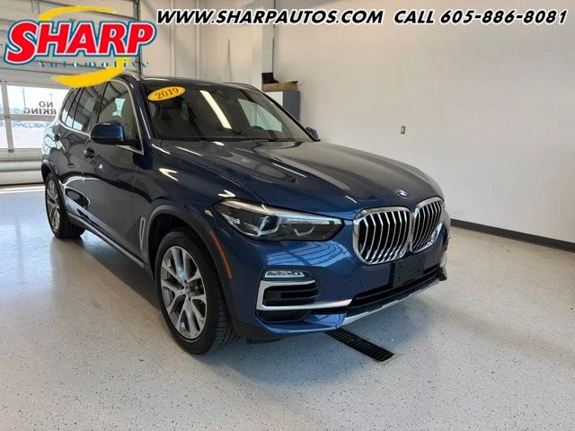 Used 2019 Blue BMW xDrive40i image 1