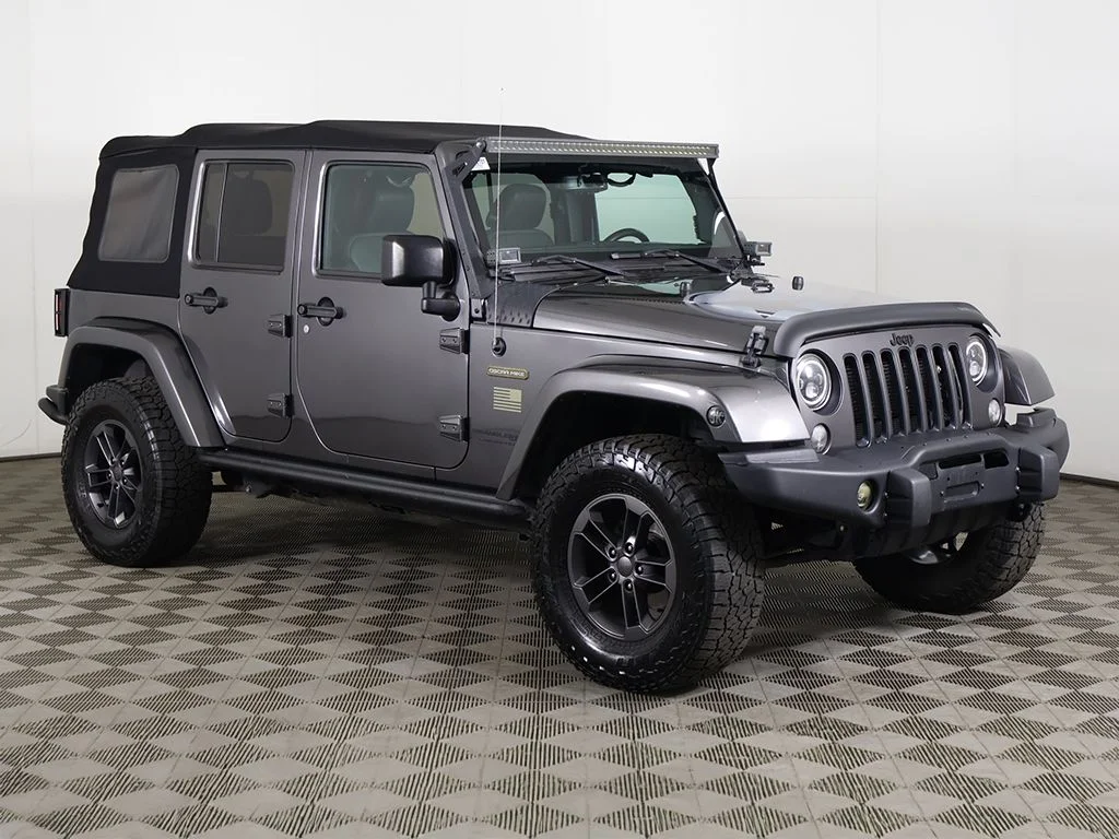 Used 2018 Granite Crystal Metallic Clearcoat Jeep Unlimited Sport image 2