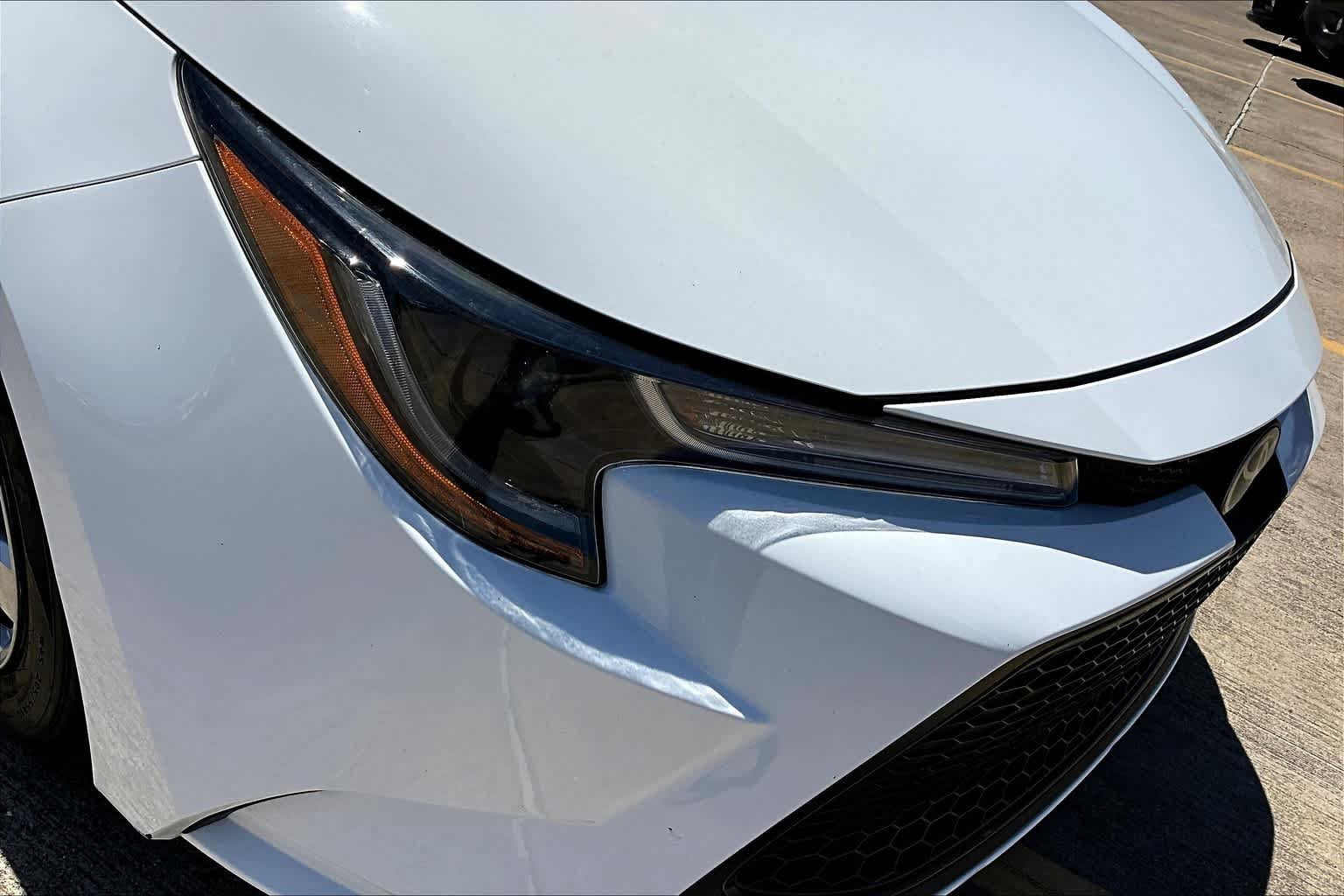 Used 2021 Super White Toyota LE image 28