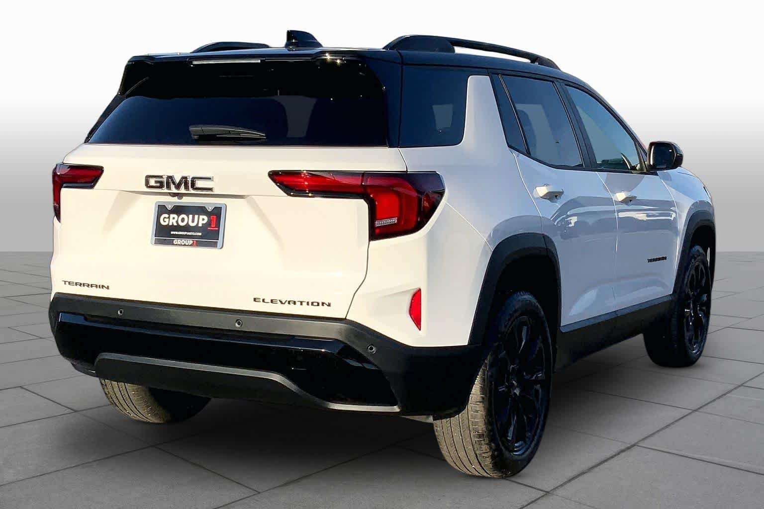 Used 2026 Summit White GMC FWD Elevation image 13
