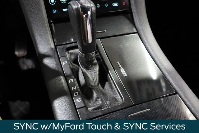 Used 2014 Tuxedo Black Metallic Ford SHO image 24