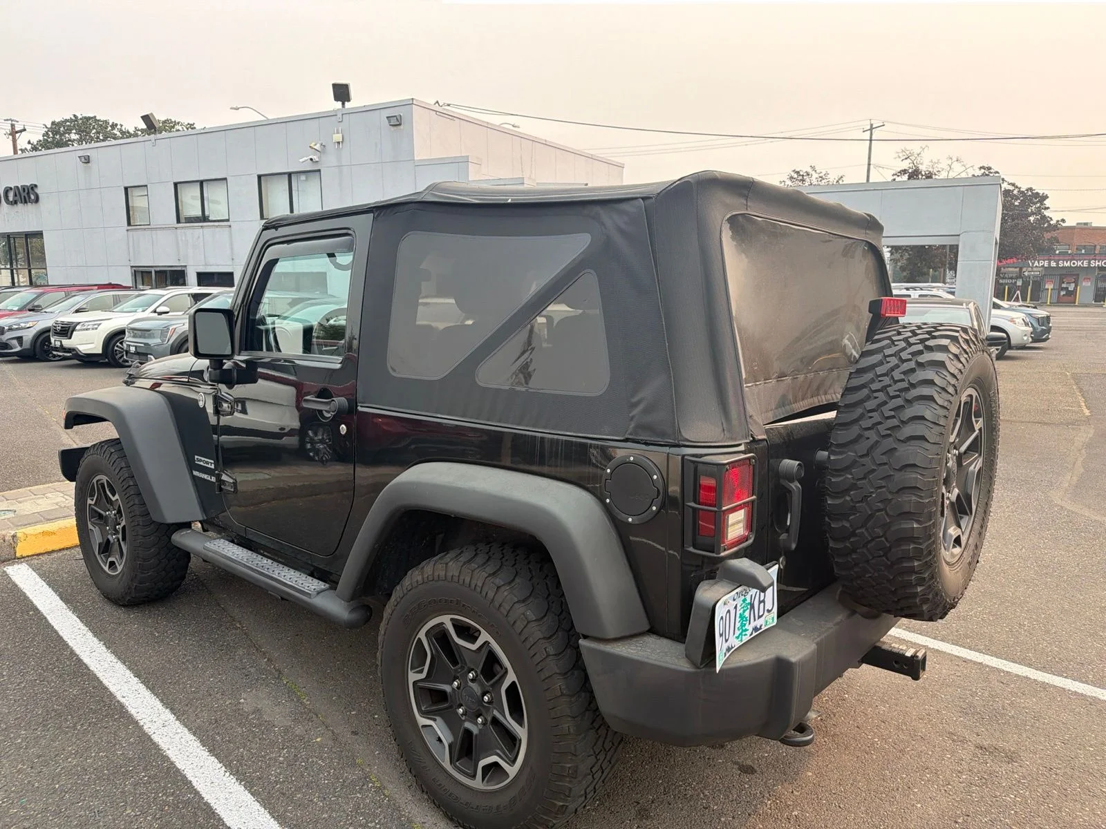 Used 2012 Black Jeep Sport image 3