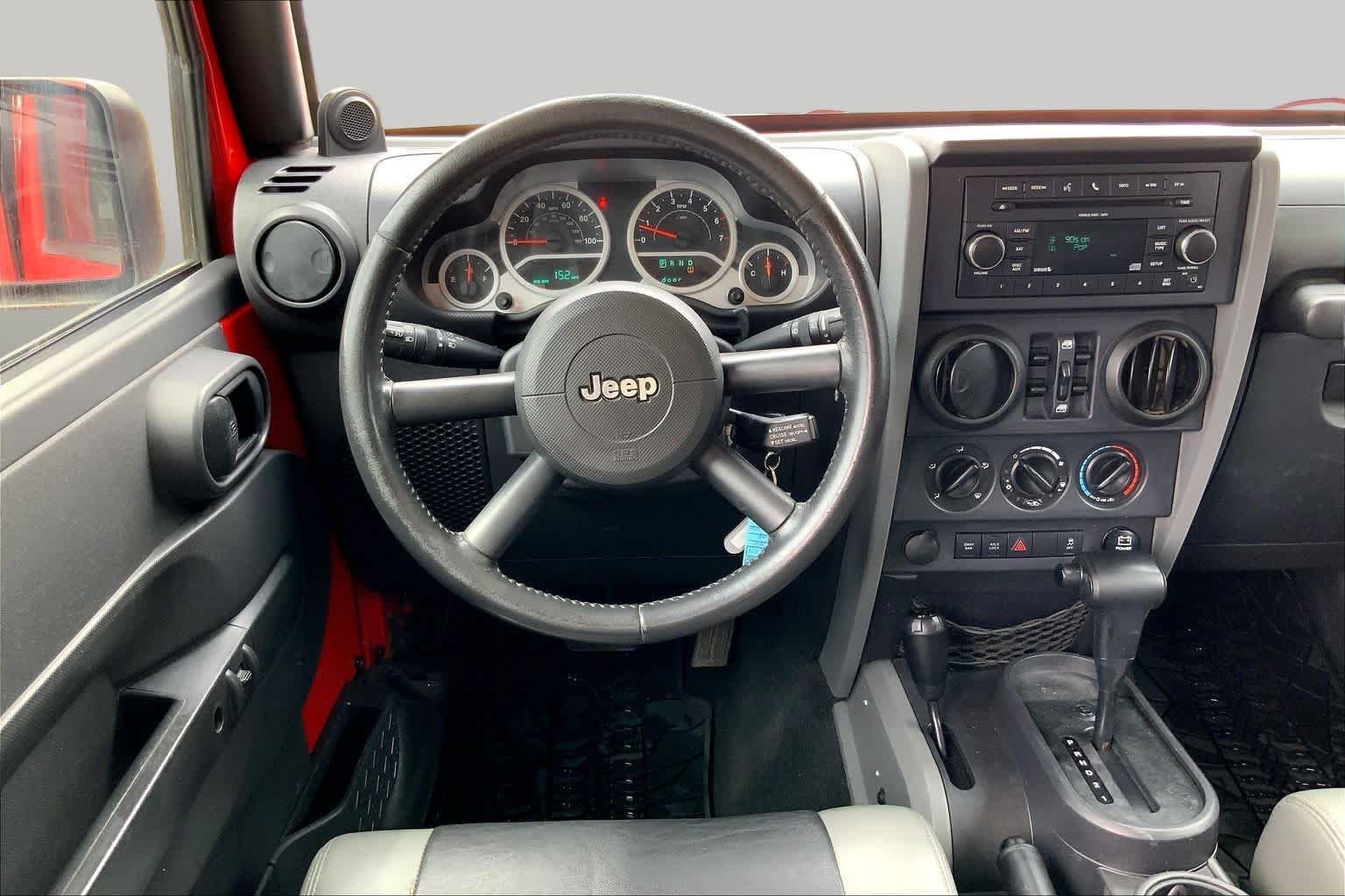 Used 2010 Flame Red Jeep Rubicon image 5