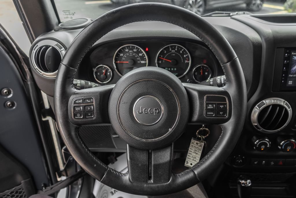 Used 2017 Black Jeep Unlimited Sahara image 22