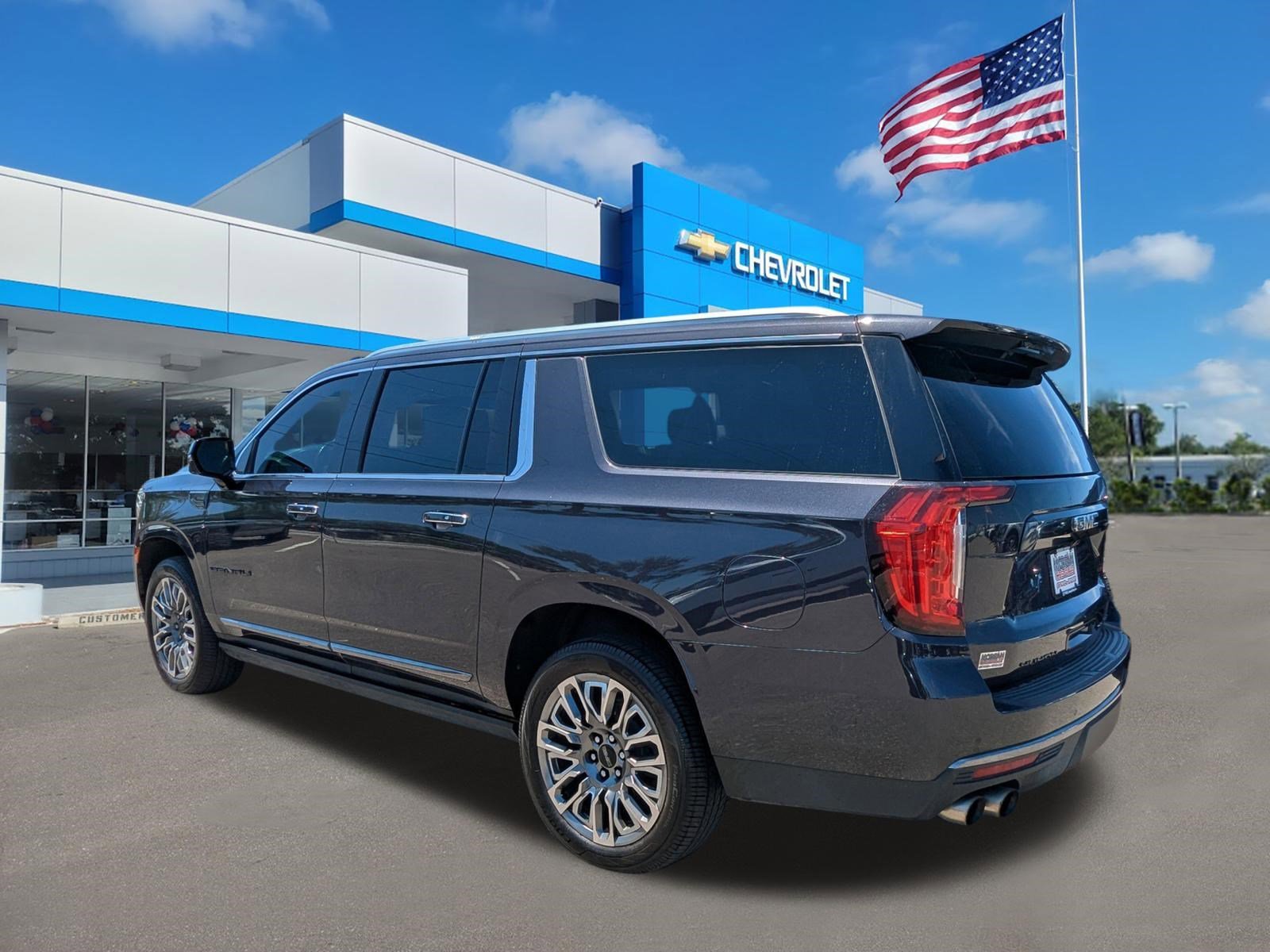 Used 2023 Titanium Rush Metallic GMC Denali Ultimate image 6