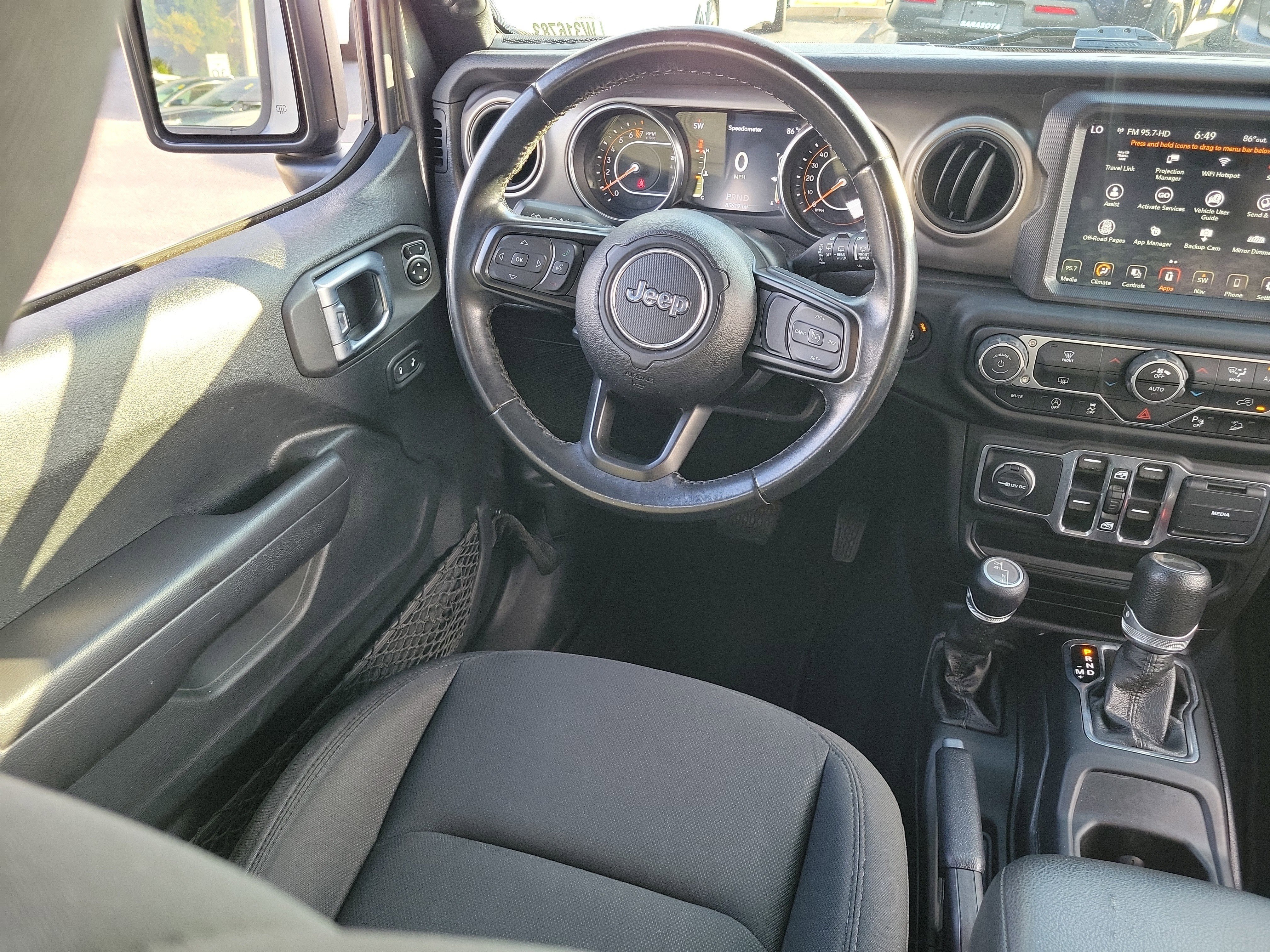 Used 2020 Granite Crystal Metallic Clearcoat Jeep Sport S image 16