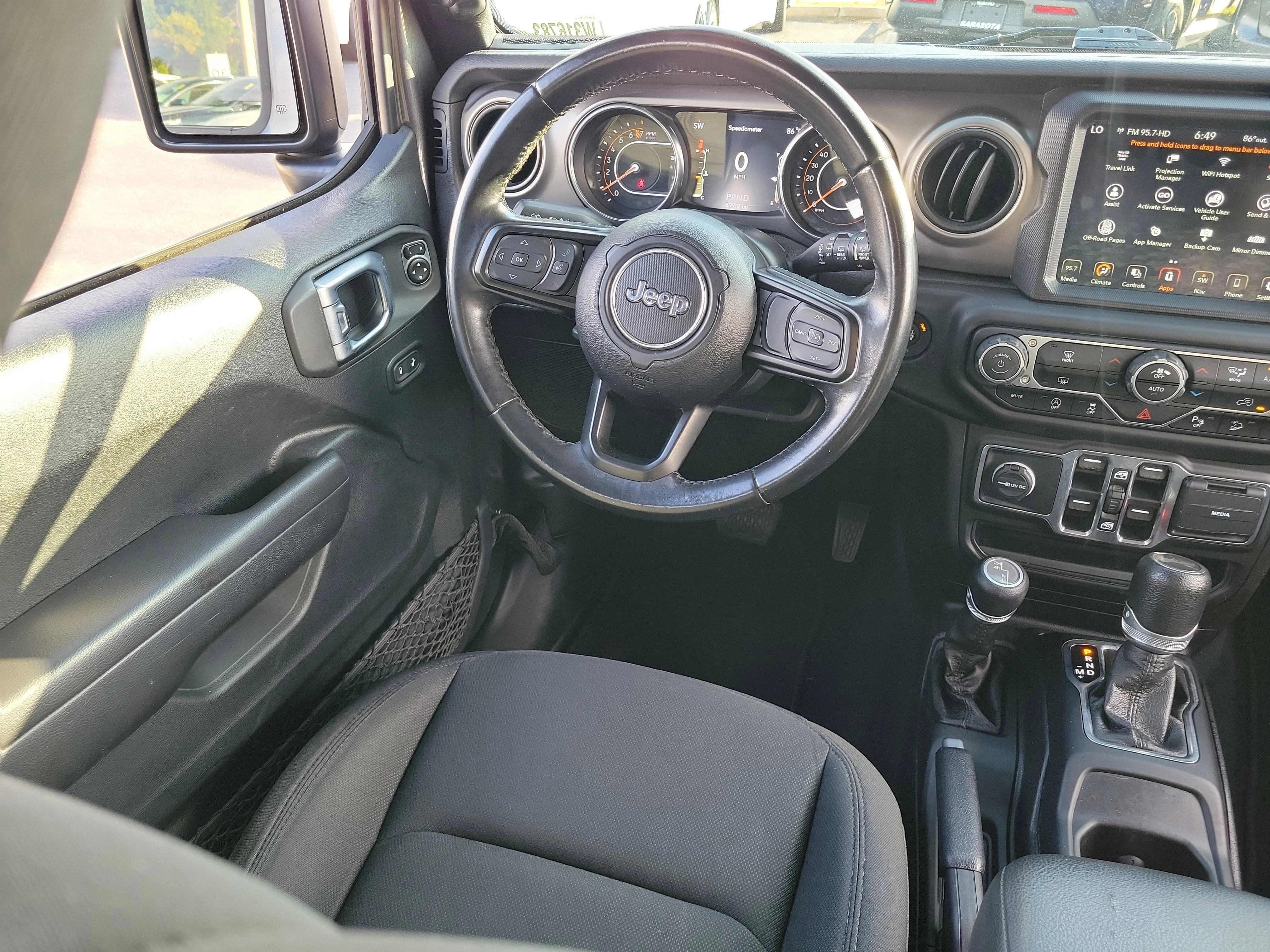Used 2020 Granite Crystal Metallic Clearcoat Jeep Sport S image 17