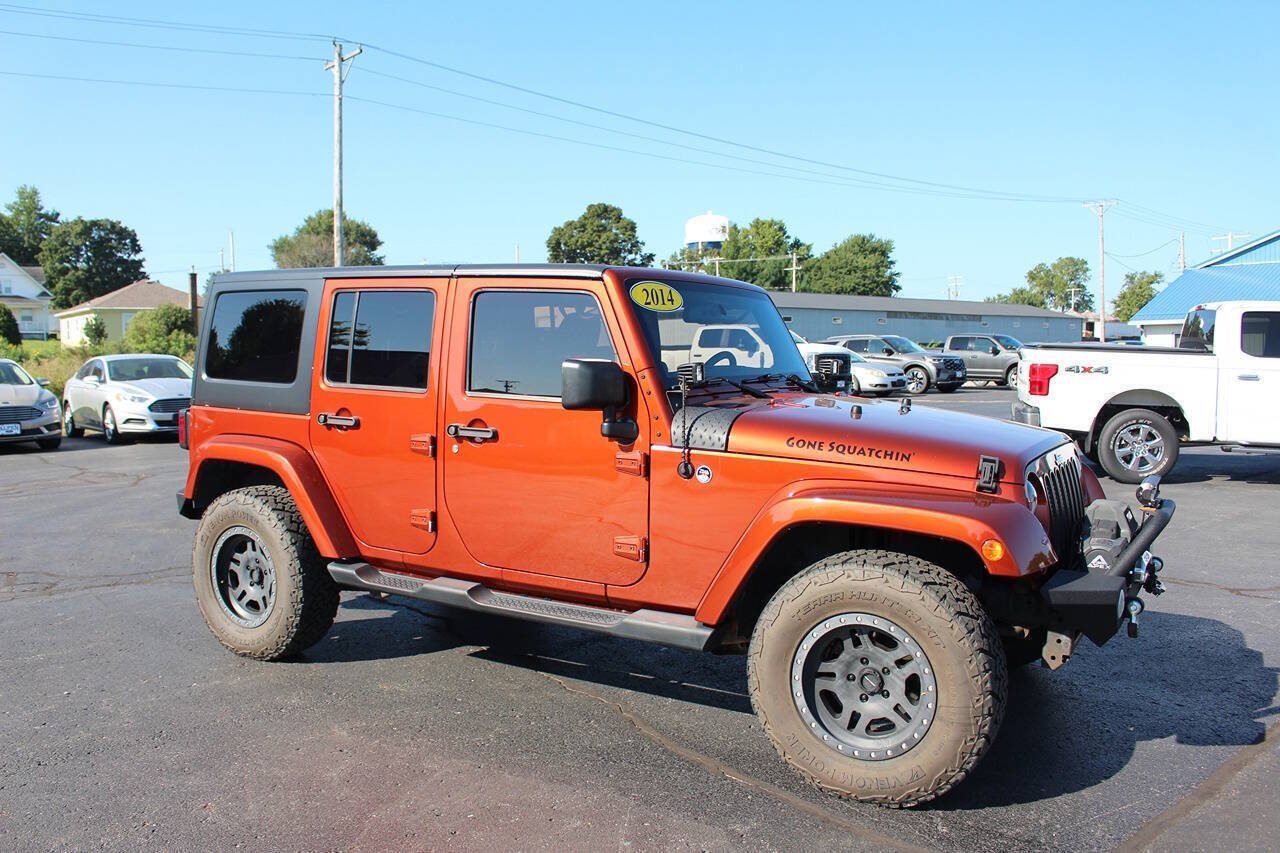 Used 2014 Copperhead Pearl Coat Jeep Sahara 4x4 4dr SUV image 3
