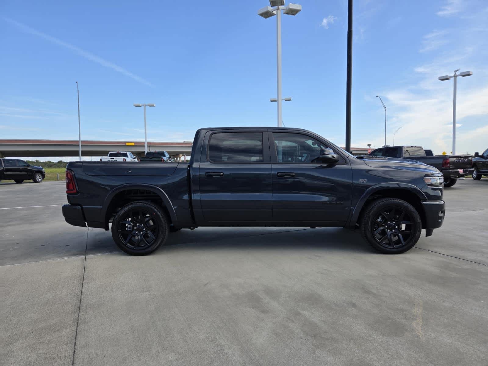 New 2027 Forged Blue Metallic Exterior Paint RAM Laramie image 6