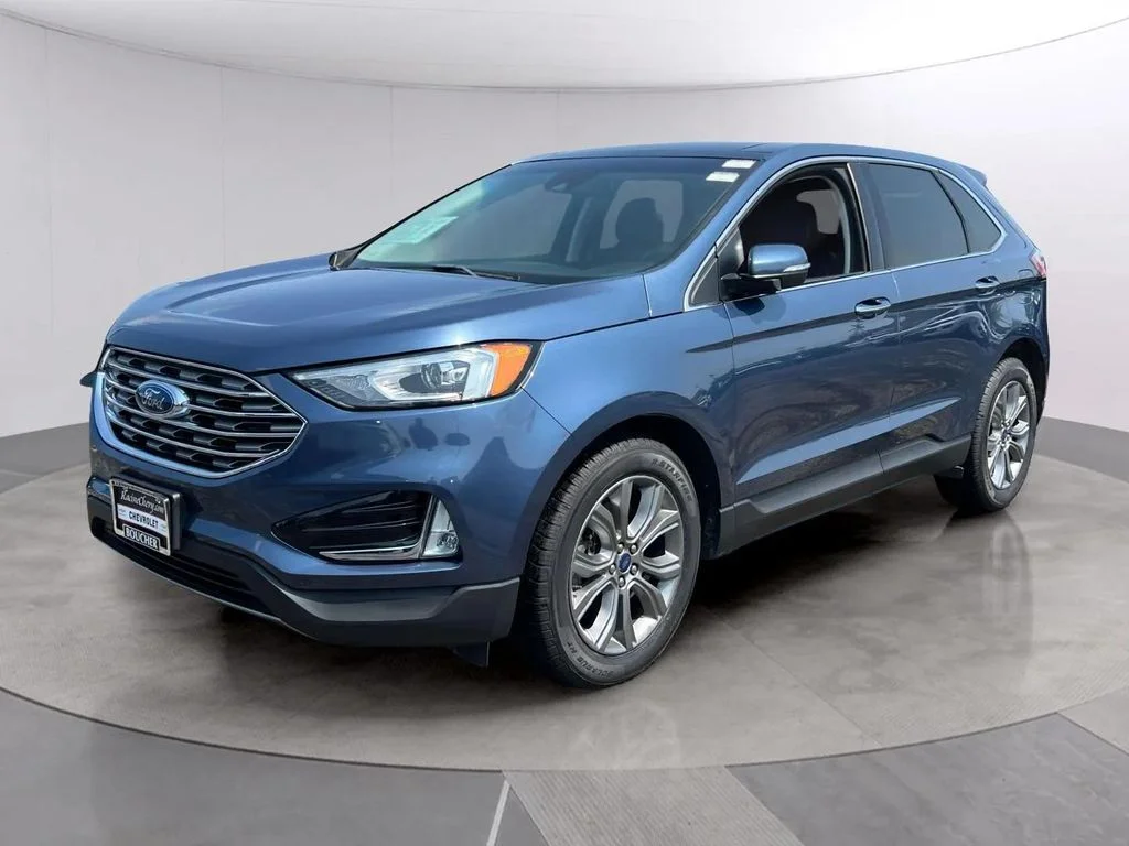 Used 2019 Blue Metallic Ford Titanium image 2