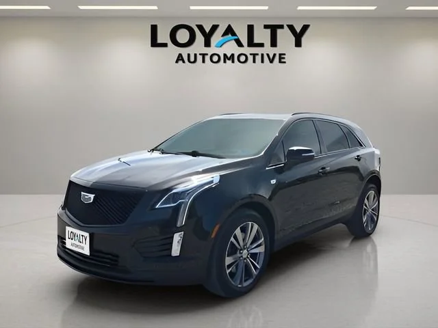 Used 2021 STELLAR BLACK METALLIC Cadillac AWD Sport image 1