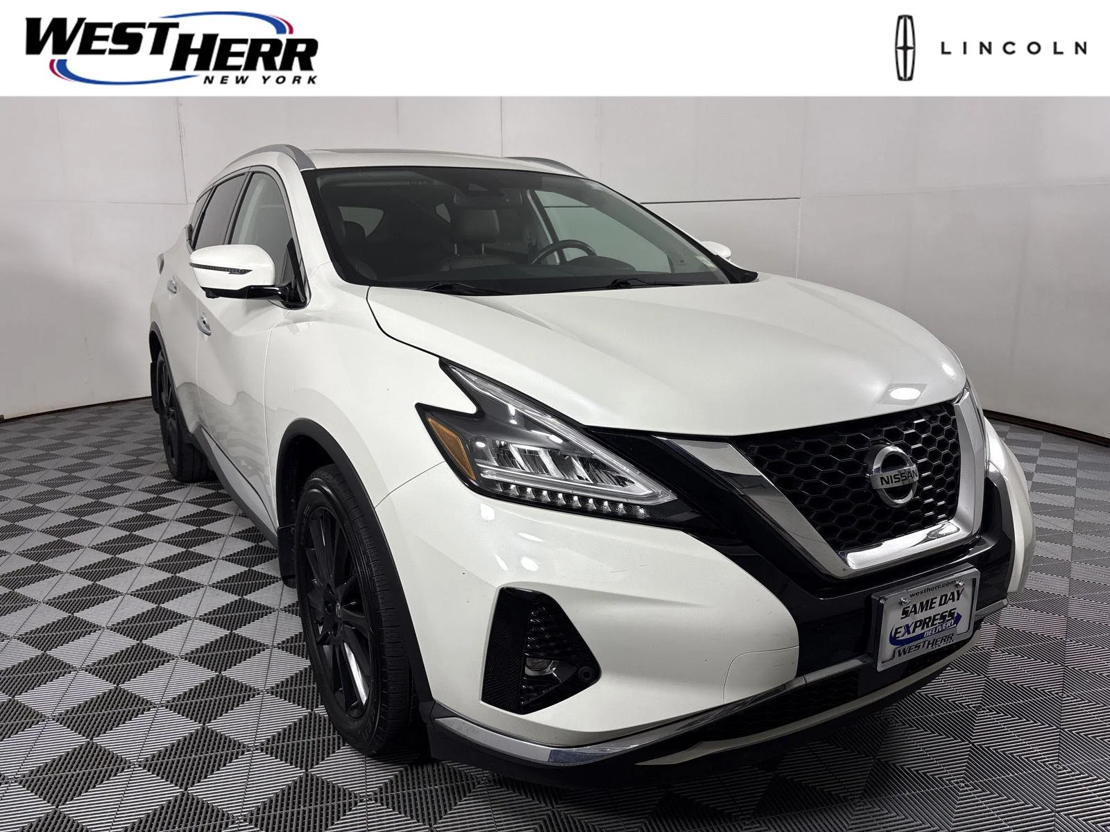 Used 2020 Pearl White Tricoat Nissan Platinum image 1
