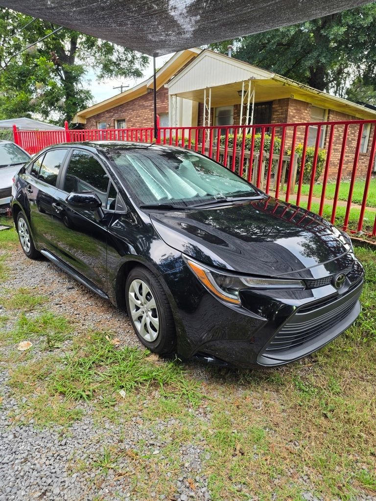 Used 2024 Black Toyota LE image 1