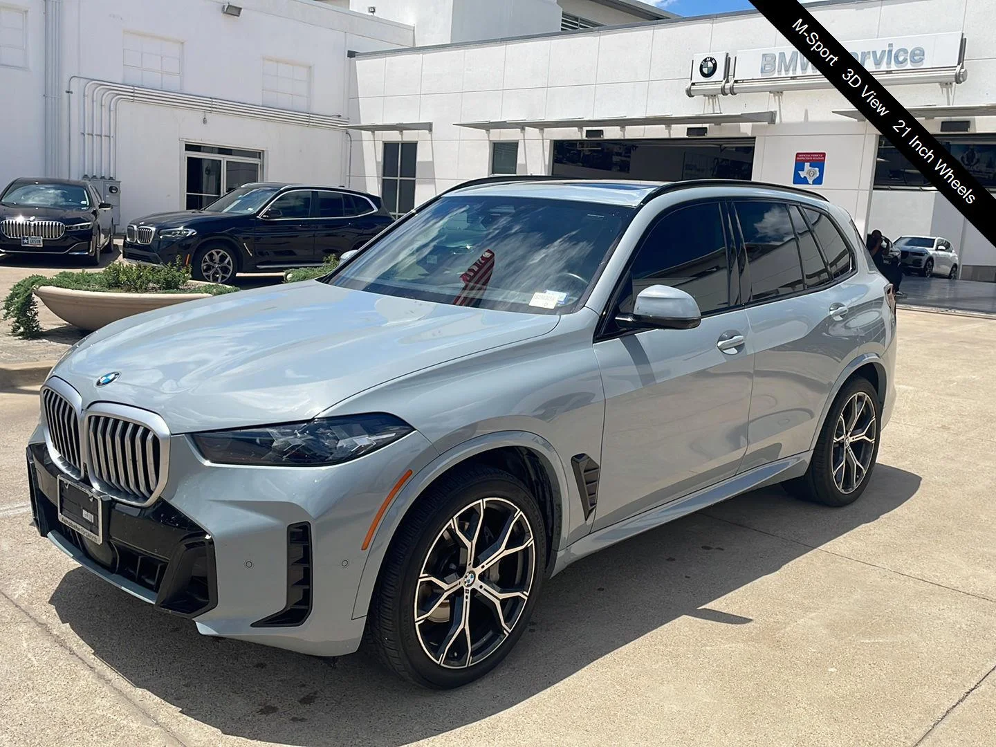 Used 2024 Brooklyn Grey Metallic BMW xDrive40i image 1