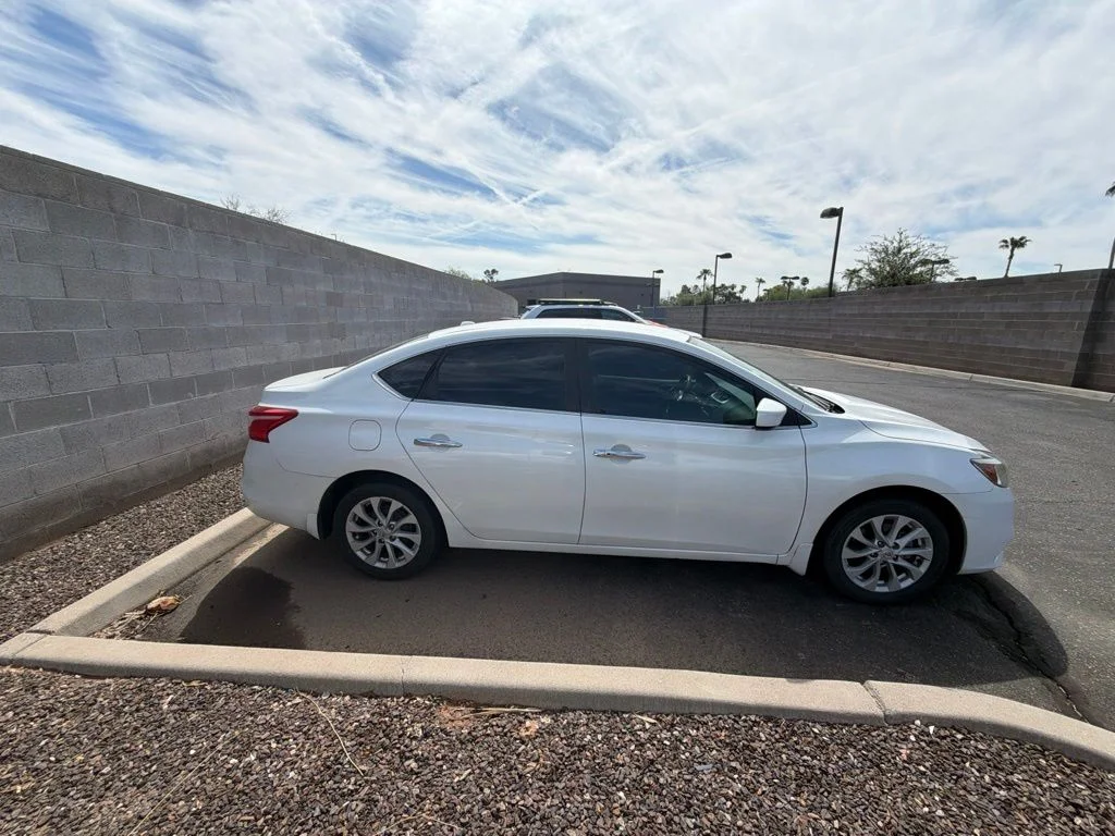 Used 2019 White Nissan SV image 4