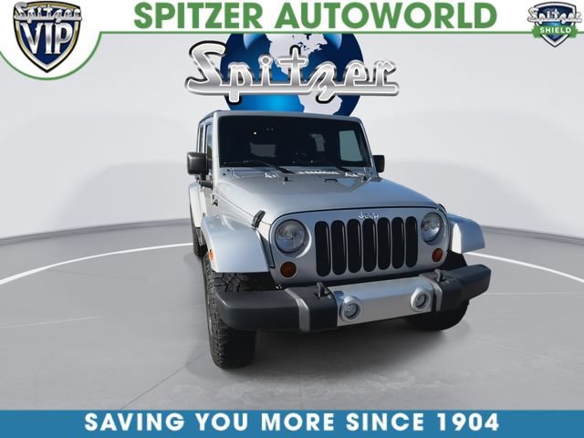 Used 2011 Silver Jeep Sahara image 3