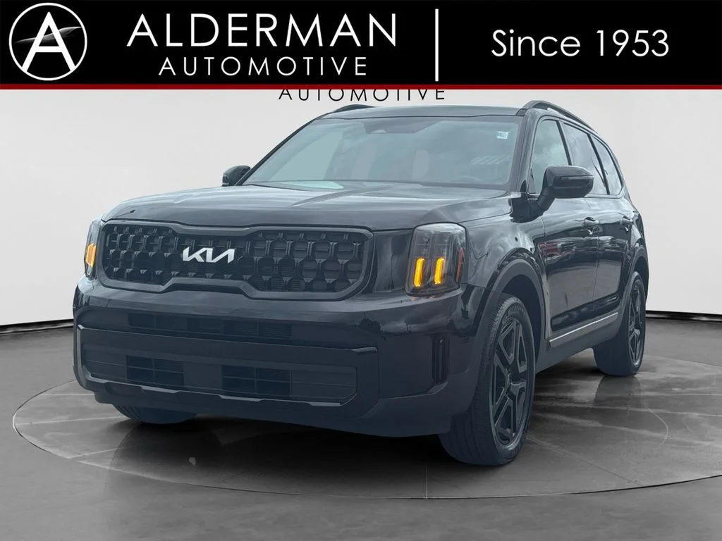 Used 2024 Black Kia EX X-Line image 1