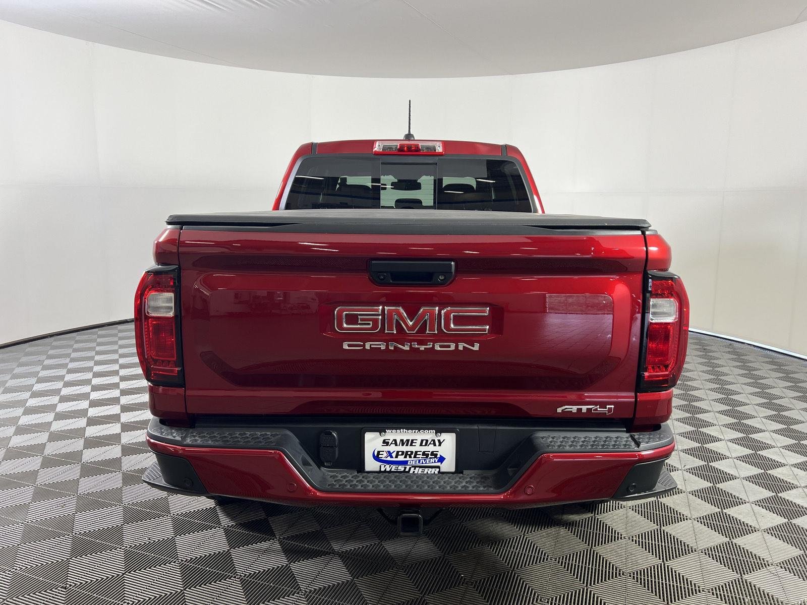 Used 2025 Volcanic Red Tintcoat GMC 4WD AT4 image 24