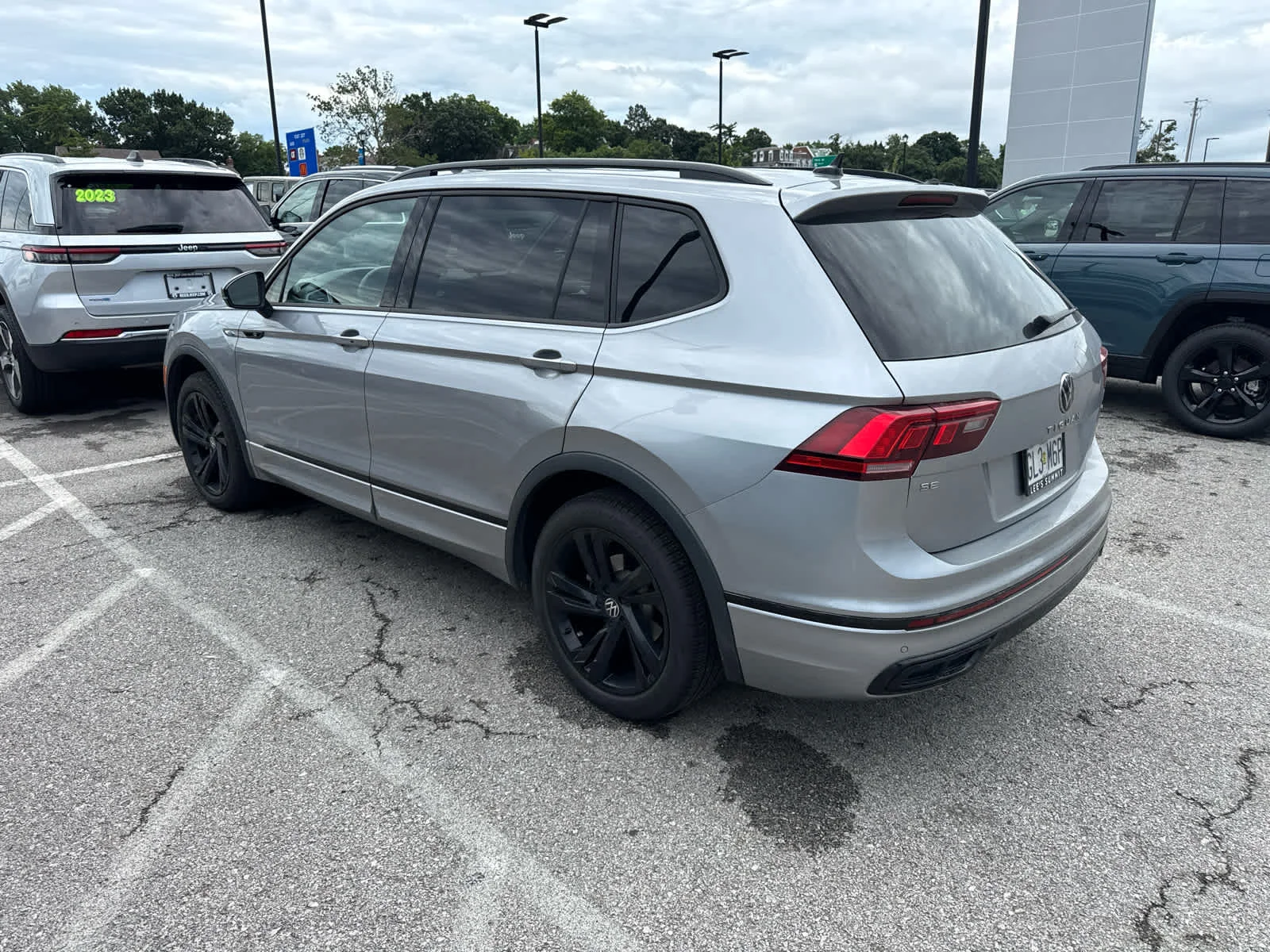 Used 2024 Pyrite Silver Metallic Volkswagen SE R-Line Black image 6