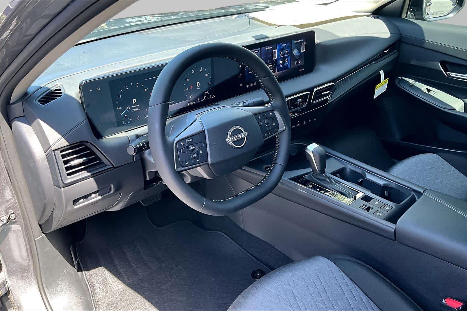 New 2026 Gun Metallic Nissan SV image 8
