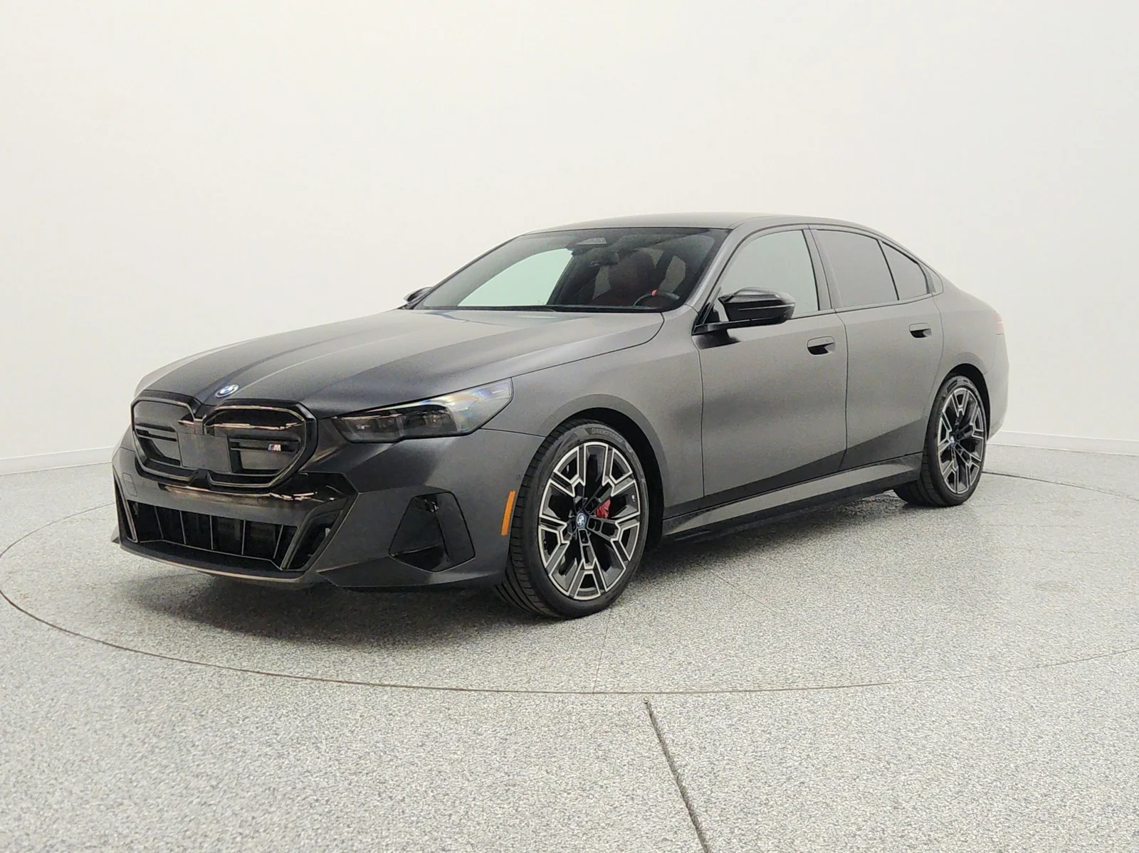 Used 2024 Frozen Deep Grey BMW M60 Sedan image 1