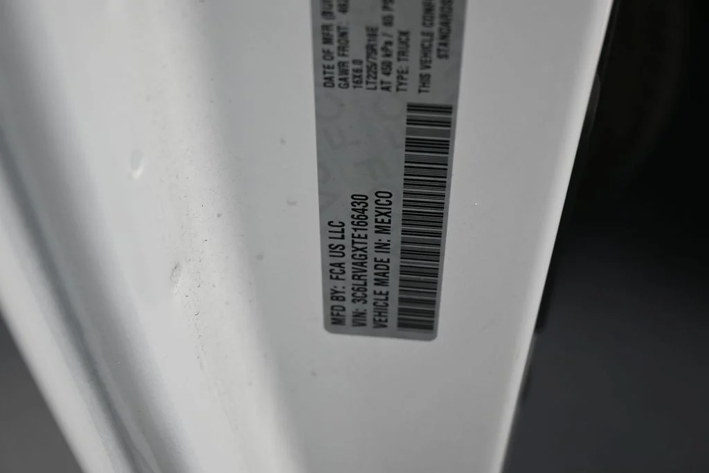 Used 2026 Bright White Clearcoat Ram Low Roof image 18