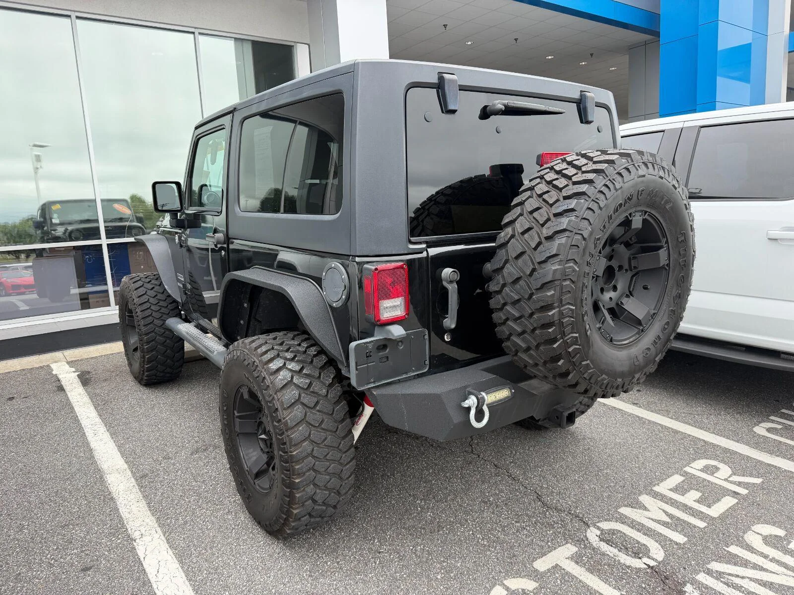 Used 2014 Black Clearcoat Jeep Sport image 3